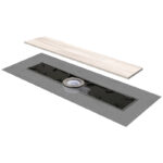 Sistema de desagüe oculto bajo pieza cerámica, diseñado para duchas con pendientes a 1, 2 o 4 direcciones.